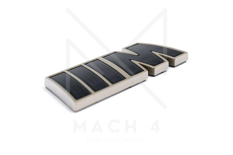 Laden Sie das Bild in Galerie -Viewer, BMW M Badge Emblem black/gold für BMW Modelle - 51145A3F9B3