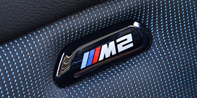 Laden Sie das Bild in Galerie -Viewer, BMW M Blende Lehne M2 Logo schwarz beleuchtet - 52109503037